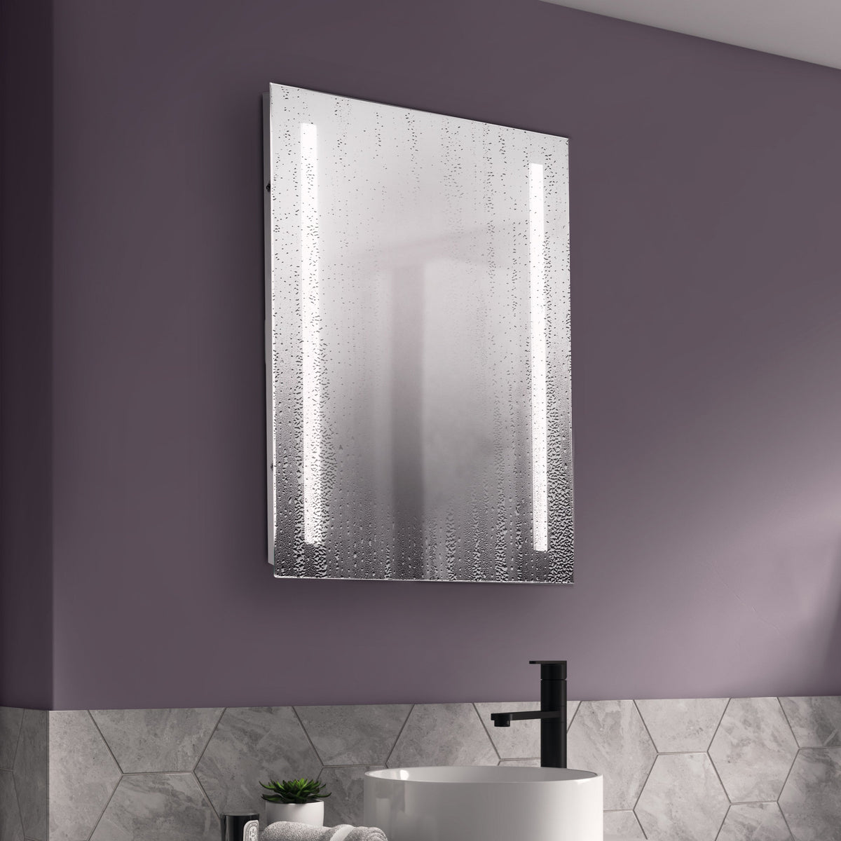 LED bathroom mirror with demister in a bathroom